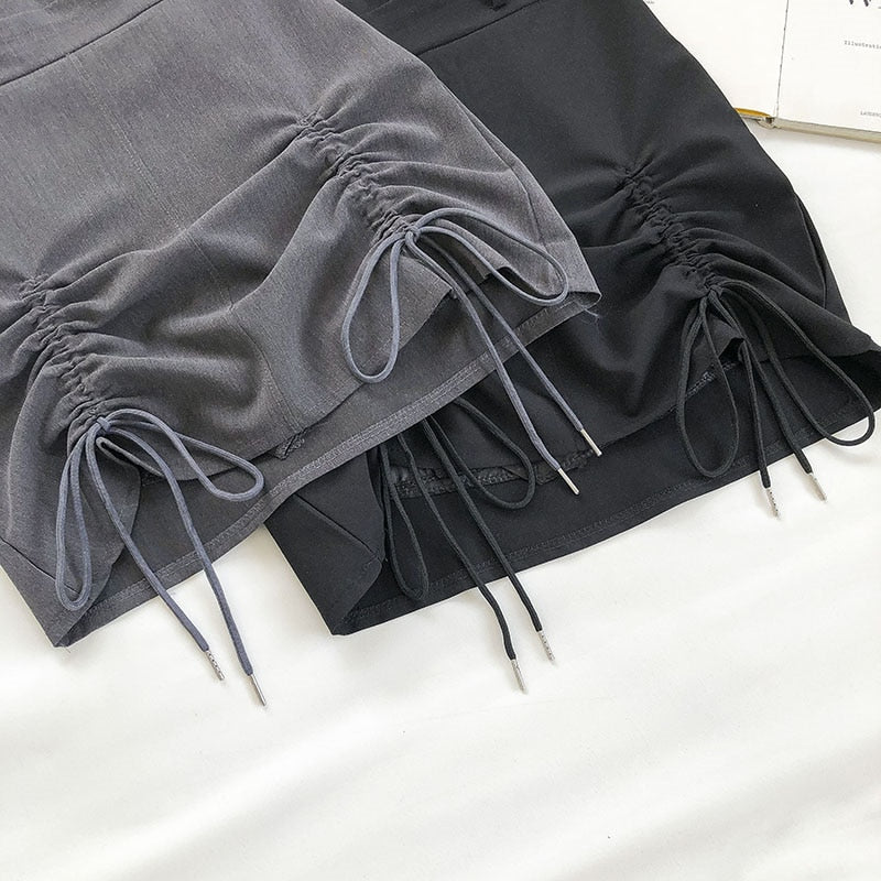 "BUCKLE" RUCHED SKIRT
